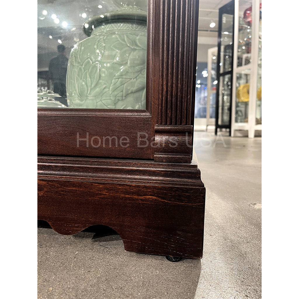 Howard Miller Dublin Curio Cabinet 680337 real photo of the adjustable levelers - Home Bars USA
