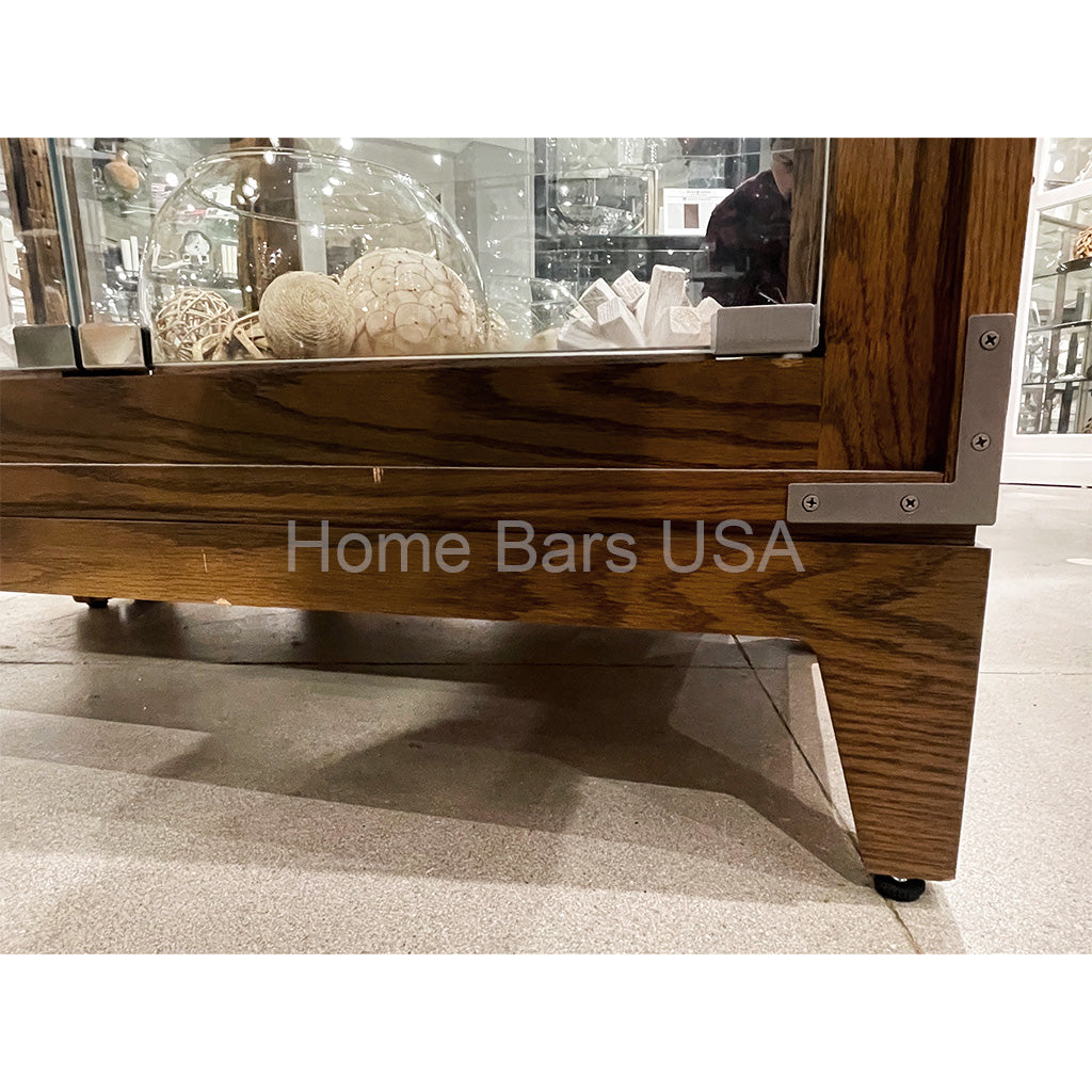 Howard Miller Elisa Curio Cabinet 680740 real photo of the adjustable levelers - Home Bars USA