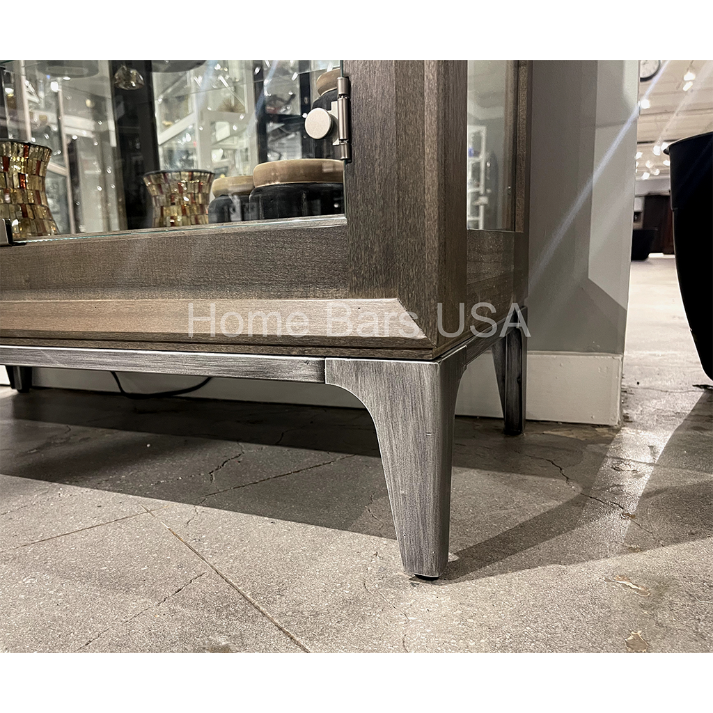 Howard Miller Sheena III Curio Cabinet 680694 real photo of the adjustable levelers - Home Bars USA