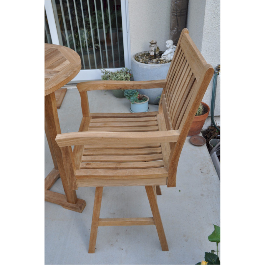 Anderson Teak Rialto Swivel Outdoor Bar Armchair in a patio - Home Bars USA