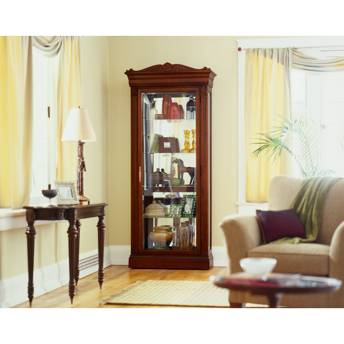 Howard Miller Embassy Curio Cabinet 680243 in home interior - Home Bars USA