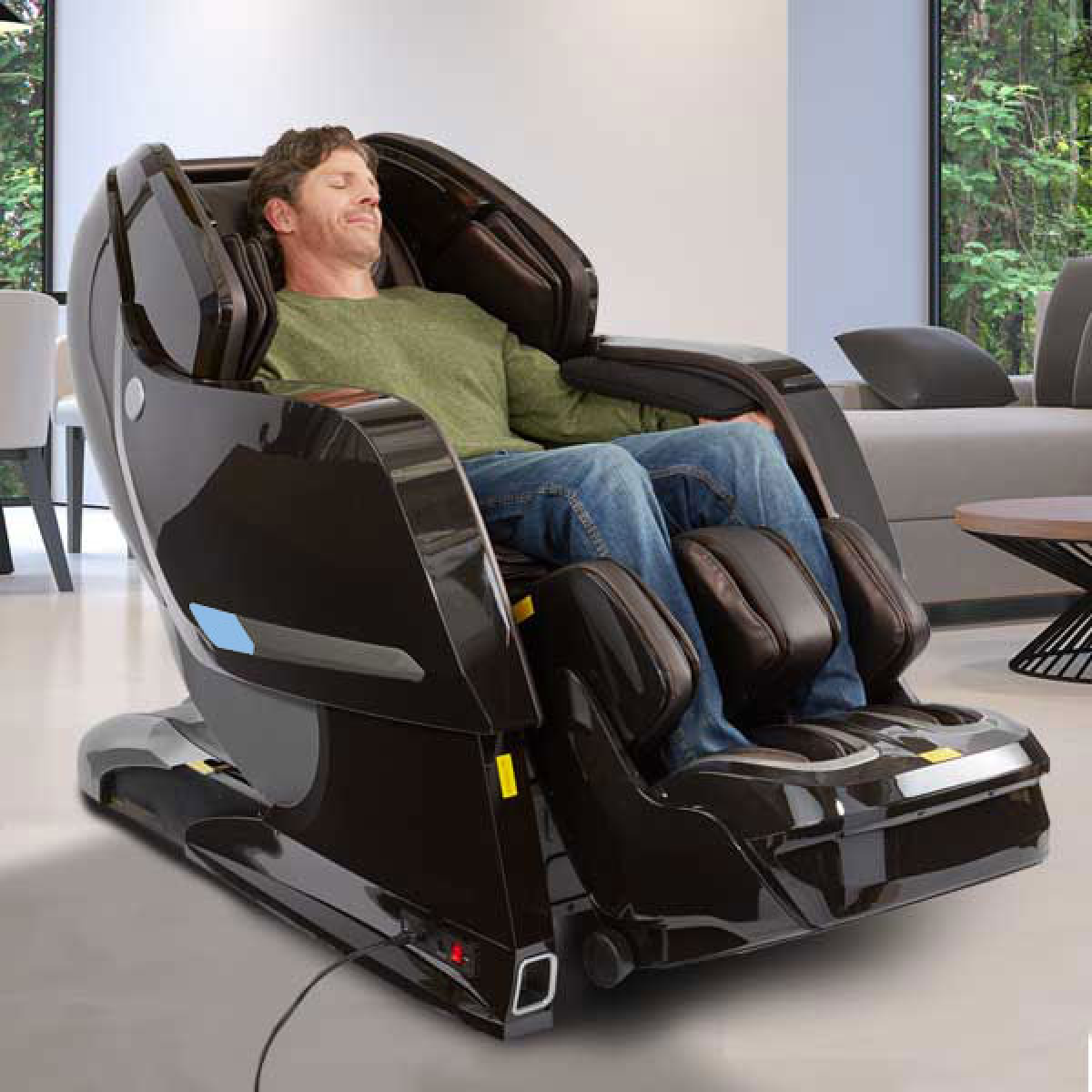 Kyota Yosei 4D Massage Chair M868 in Brown in interior reclined with a man sitting inside enjoying massage - Home Bars USA