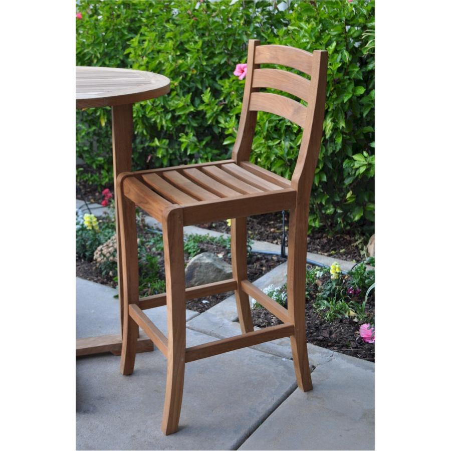 Anderson Teak Mandalay Outdoor Bar Chair lifestyle in a garden - Home Bars USA