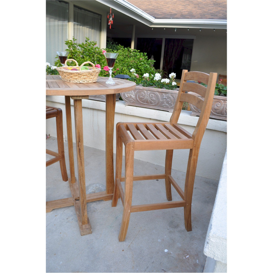 Anderson Teak Mandalay Outdoor Bar Chair in a patio - Home Bars USA
